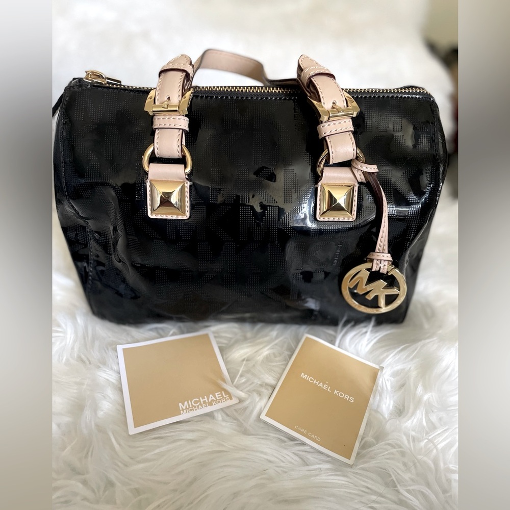 Authentic Michael kors satchel black patent leather bag with tan and gold detail